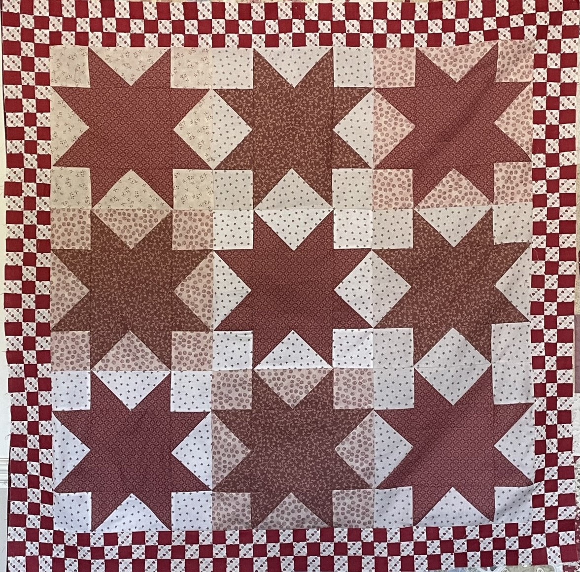 Finished Quilt Sample - Sawtooth Star with checkerboard border